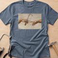 The Creation of Jewelry Making metalsmith t-shirt in Dark Heather, flat lay with jeweler's tools